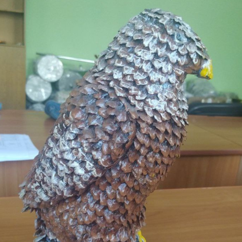 Vogelfigur aus Holz.